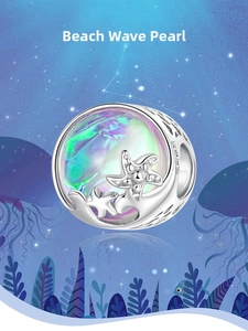 Macro detail of S925 sterling silver ocean charm with starfish and wave motif