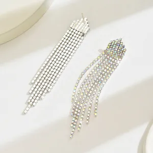 Detail of long waterfall tassel earrings with silver square and AB colorful rhinestones