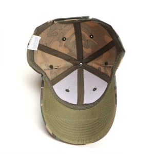 Detail view of the camouflage baseball cap showing internal structure and polyester lining