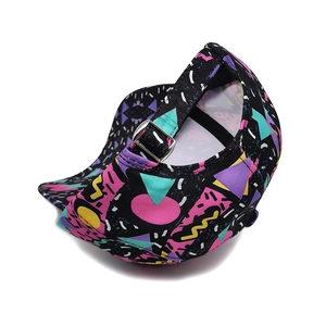 Detail of adjustable silver metal buckle on colorful geometric print baseball cap