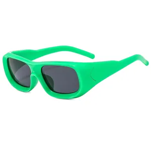 Trendy retro square green sunglasses with thick frame and dark grey lenses on white background