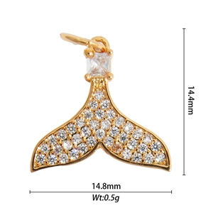 Detail of whale tail pendant with inlaid gems including height and weight measurements