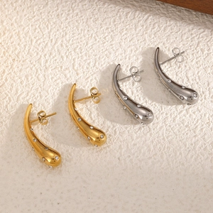 Elegant 18k gold and silver teardrop earrings featuring cubic zirconia stones