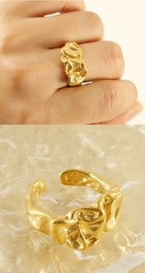Detailed close-up and model view of an 18K gold plated irregular lava texture open ring
