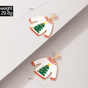Detail of Christmas sweater earrings featuring green tree patterns and red striped accents