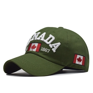 Detail of army green cotton baseball cap featuring Canada embroidery and 1867 flag logos