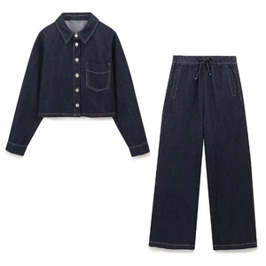 Women's dark indigo denim two-piece set with long sleeve jacket and wide leg pants