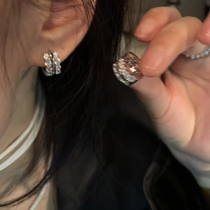 Silver leaf-shaped hoop earrings with cubic zirconia inlay for elegant daily wear