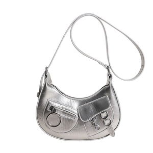 Silver metallic hobo crossbody bag for women, trendy punk style shoulder bag with pockets.