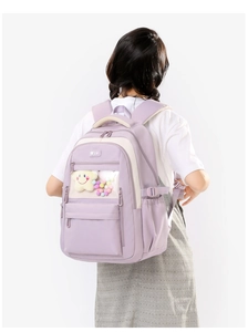 Detail of purple nylon backpack with transparent window and comfortable padded shoulder straps