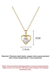 Detail view of gold heart pendant with zircon, 1.5x2cm size and 45cm titanium steel chain