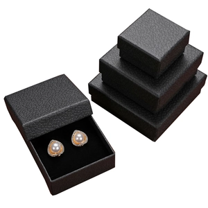 Stack of black lychee texture jewelry boxes for earrings, bracelets and necklaces
