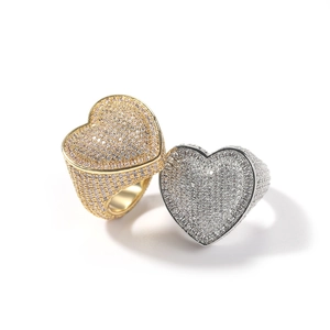 Hip hop heart rings with 3A zircons in gold and silver plating on white background
