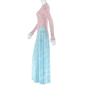 Detail view of pink and blue contrast print dress with long sleeves and pleated hem