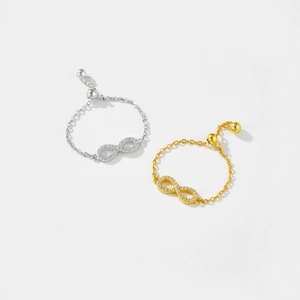 Adjustable S925 sterling silver infinity rings with sparkling cubic zirconia in gold and silver