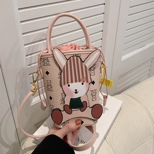 Chic pink cartoon bucket bag with a plush bunny design and stylish crossbody strap