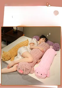 Detail of soft plush long animal body pillow with curly faux fur texture and cute animal face