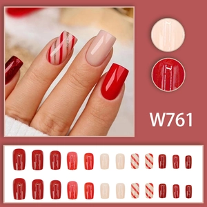 Square red and nude pink press-on nails with Christmas gold glitter stripes design