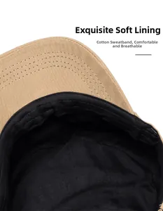 Detailed macro view of the soft cotton inner lining and sweatband on a casual flat top cap