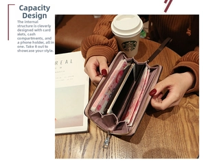 Detail view of women's long wallet showing multiple card slots and smartphone compartment
