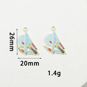 Detail view of light blue enamel stationery charms with dimensions 26mm by 20mm