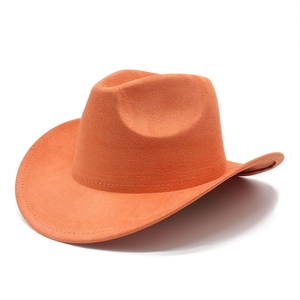 Close-up of orange suede cowboy hat with classic curved brim and detailed stitching