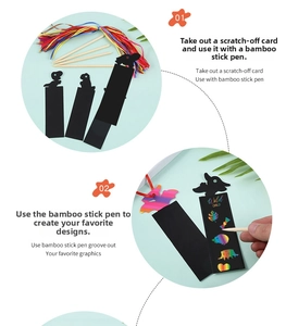 Detail of dinosaur scratch art bookmark with wooden stylus and colorful ribbon ties