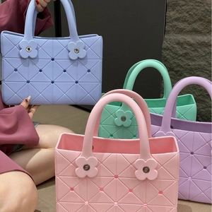 Waterproof EVA beach tote bag with lattice pattern and flower detail in four pastel colors