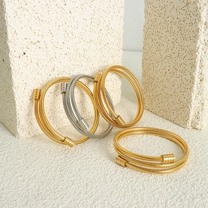 Minimalist spiral snake-style titanium steel gold and silver stacked bangle bracelets