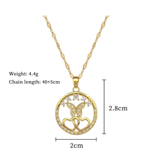 Detail view of gold butterfly heart pendant with dimensions and weight parameters