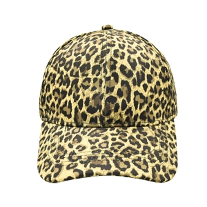 Close-up of leopard print baseball cap featuring high-quality twill fabric and curved brim