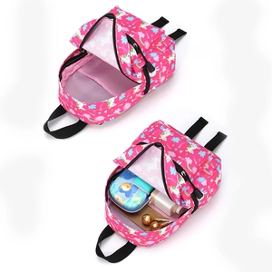 Pink unicorn school bag for kids with rainbow prints and large interior storage