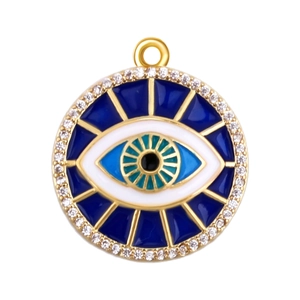 Detailed view of round evil eye pendant in gold-plated brass with blue enamel and zircon stones