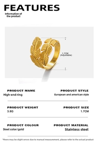 Macro detail of gold feather open ring showing adjustable band and stainless steel texture