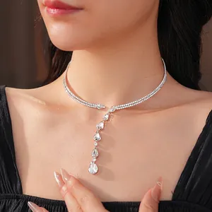 Sparkling double-layer necklace with pear-cut zircon pendants for women on model