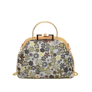 Floral print handbag with gold metal frame and chain strap on white background