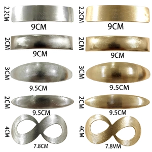 Set of ten geometric alloy hair clips in gold and silver finishes with various dimensions