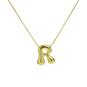 Close-up of golden bubble letter R pendant on a thin box chain with a polished finish