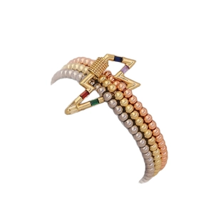 Three-strand bead bracelet in silver, gold, and rose gold with a colorful zircon lightning charm
