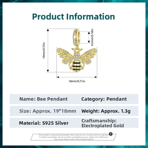 Detailed view of S925 sterling silver honey bee charm with gold plating and white zircons