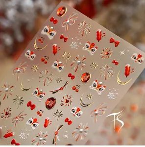Detailed 5D embossed nail stickers featuring festive red lion dance and golden firework patterns