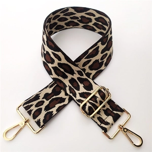 Close-up of 5cm leopard print jacquard bag strap with adjustable gold metal buckles