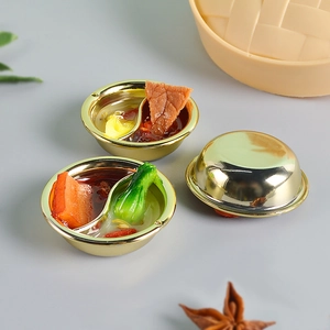 Miniature hot pot food model set with tiny ingredients and metallic golden bowls