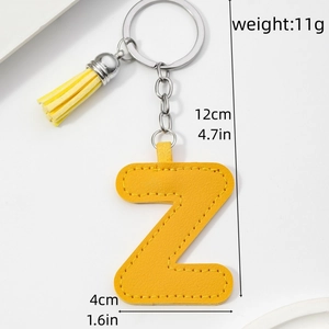 Yellow PU leather letter Z keychain with tassel showing dimensions 12cm by 4cm