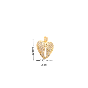 Detail of gold heart pendant with cubic zirconia inlay and precise dimensions 18.3x17.7mm