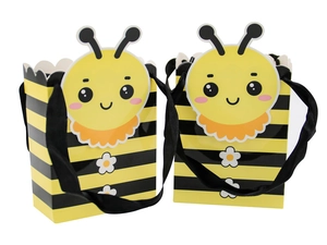 Detail of cartoon bee gift boxes with yellow stripes and black silk handles