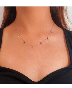Detail of 925 silver necklace featuring colorful rectangular zircons worn by a model