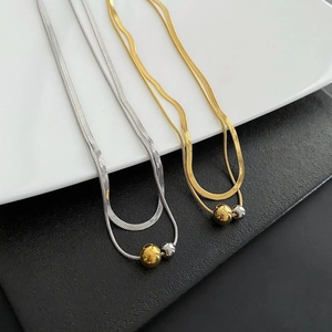 Double-layered gold and silver ball necklace with flat herringbone chain in titanium steel