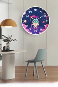 Close-up of a 10-inch silent astronaut wall clock with starry sky dial for kids room