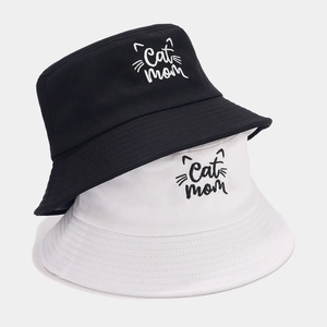 Black and white cotton bucket hats featuring embroidered Cat Mom text and cat whiskers